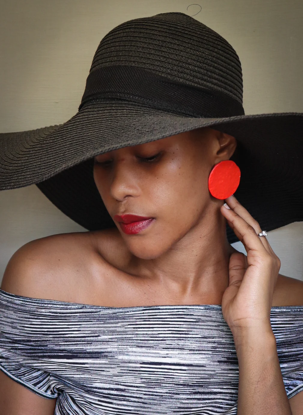 Minimalist polymer clay earrings on a neutral background